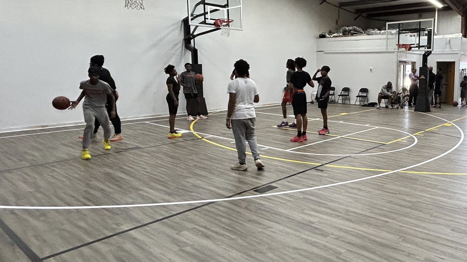A pickup basketball run on the indoor court at Max Speed Elite in Columbia, South Carolina